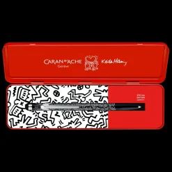 Estuche metálico con bolígrafo Negro Keith Haring Caran d'Ache