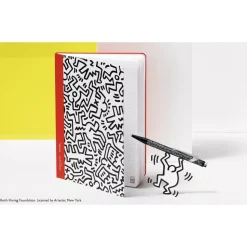 Estuche metálico con bolígrafo Negro Keith Haring Caran d'Ache