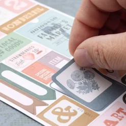 SUPER OFERTA **40%** Libro de Stickers Market Square Maggie Holmes